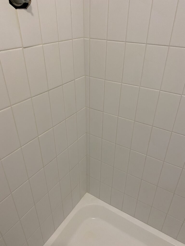 Grid Pattern Guest Shower Tile in Oakland, photo 1